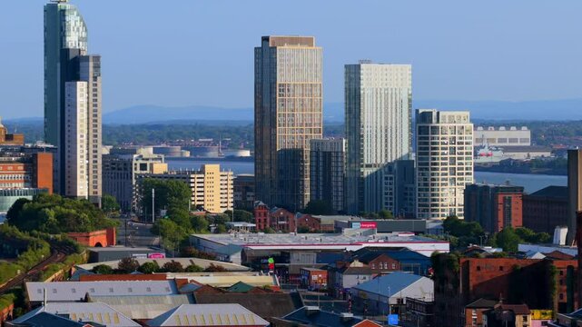 Liverpool city skyline from the Vauxhall area featuring an old Tabacco warehouse and modern skyscrapers. 
