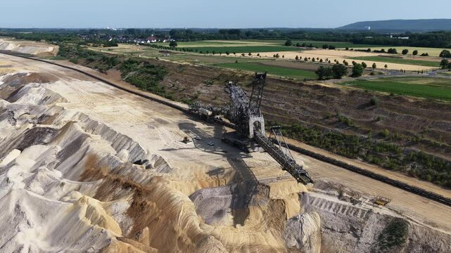 large bucket wheel excavator, aerial drone view. Lignite mining, Germany.