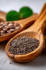 A close-up view of wooden spoons filled with chia seeds and other seeds, set against a soft backdrop, creates a warm, rustic theme ideal for health food blogs, cooking websites, or nutritional guides