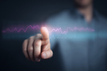 Businessman Touching Digital Interface with Interactive Chart – Technology and Data Concept