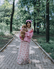 Pink summer mood of a girl with sincere emotions
