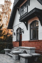 Charming house with elegant details and autumn foliage in the gardens, showcasing a cozy atmosphere during the golden hour of sunset