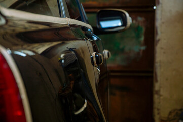 Polishing a car enhances its appearance and protects the surface, showcasing a gleaming finish in a...