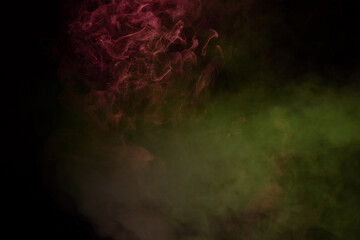 Yellow and pink steam on a black background.