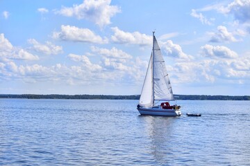 Sailing yacht sails on the sea. Seascape.