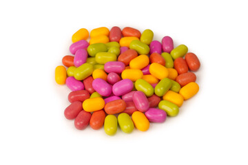 Sweet multicolored candies isolated on white background.