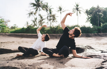 Dual upward stretch invites pause and breath-led elevation—embodied metaphor for recalibrating...