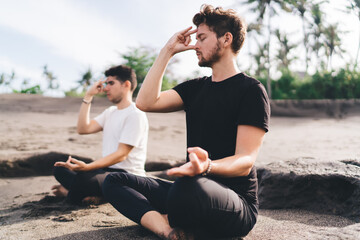 Mindful pranayama with closed eyes and gesture to forehead centers emotional clarity—an analog...