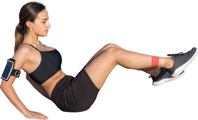 A young slim athletic girl in sportswear performs a set of exercises. Fitness and healthy lifestyle.