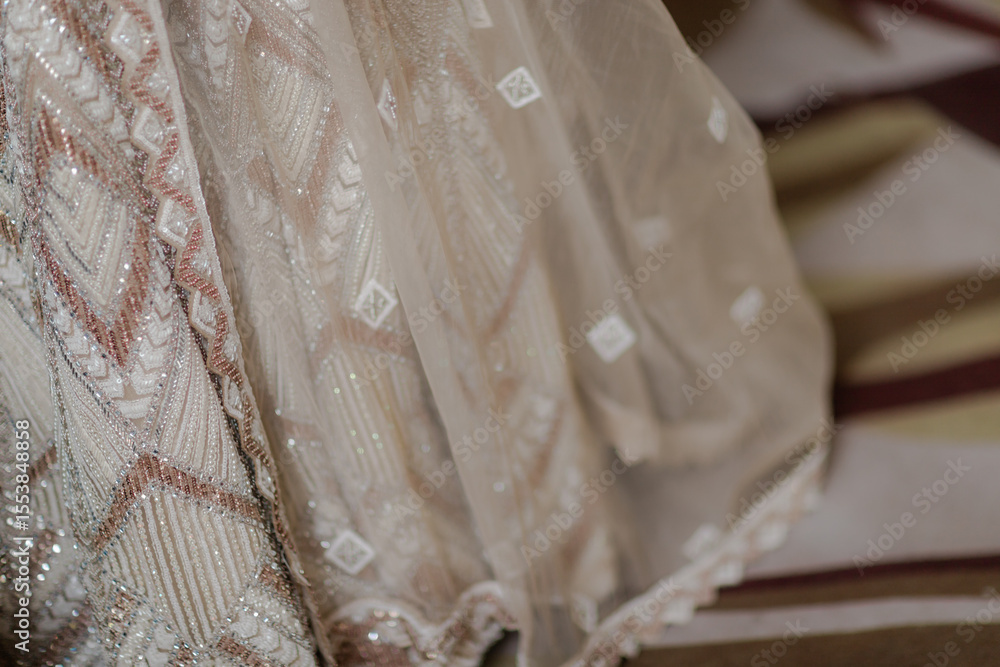 Aufkleber close-up shot of intricate fabric showcasing detailed patterns and textures, emphasizing the artistr