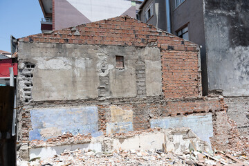 Partially Demolished Building with Exposed Brick and Plaster in Istanbul