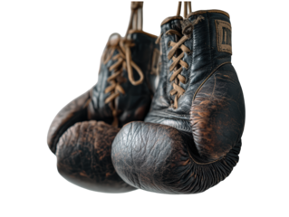 Vintage boxing gloves suspended conveying dedication isolated