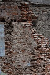 Textured Ruined Brick Wall with Exposed Mortar