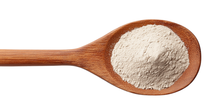 Bentonite clay powder in wooden spoon