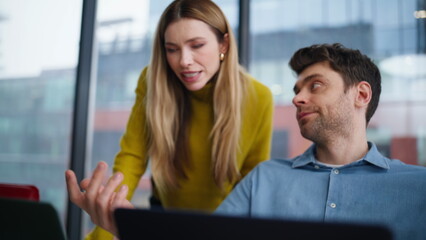 Businesswoman explaining task manager man working laptop at office closeup.