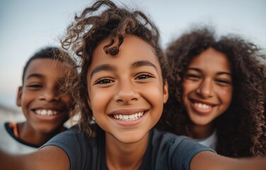 Group of diverse children sharing laughter in a joyful outdoor setting