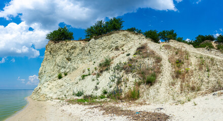 Mount Pyvykha rises along the shore of the Kremenchuk Reservoir in Ukraine, resembling a massive...