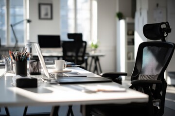 Modern bright office workspace with ergonomic chair laptops and desktop accessories spacious desk with natural light ambiance