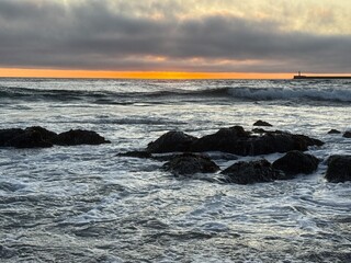Sunset over Atlantic Ocean, Praia de Árvore, Portugal