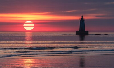 Sunrise Seascape with Lighthouse Silhouette at Ocean Shore