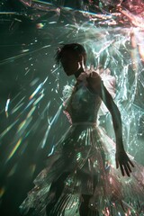 Fashion editorial shot, model wearing a dress made of glass and light, surreal textures, studio lighting, abstract background, high fashion photo