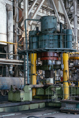 Hydraulic press in pipe factory workshop
