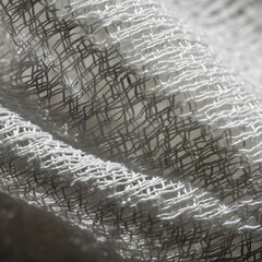 White loose weave fabric close-up, organic cotton gauze texture, sheer textile background, breathable natural material