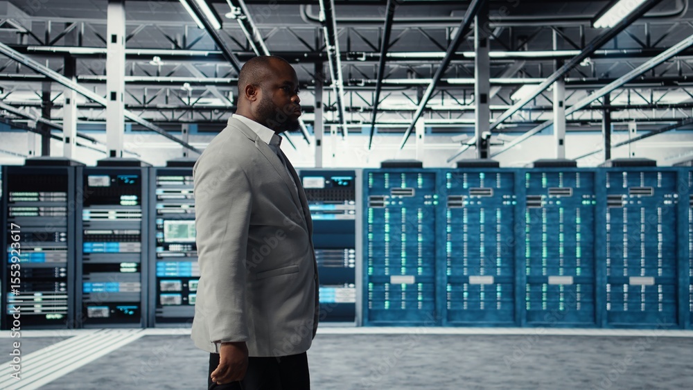 Poster system administrator walking in data center with rigs handling queries, doing backups. admin oversee