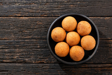 Crispy Colombian buñuelos on a plate - Traditional food