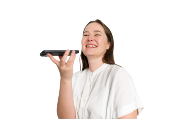 Smiling young woman enjoys a joyful conversation on her smartphone, radiating happiness in a bright and cheerful setting