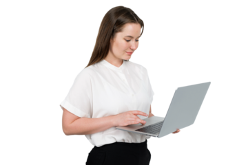 Professional woman focused on her laptop, working diligently in a minimalist 
