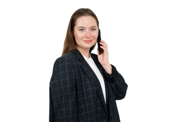 Young professional engaged in a phone conversation while wearing a stylish suit, exuding confidence and focus during a busy workday