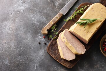 Raw foie gras block prepped for cooking or eating healthy appetizer rustic meal display food background