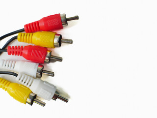 RCA cable with red, yellow, and white connectors, used for audio and video connections, isolated on...