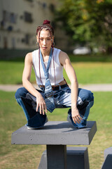 Unique urban fashion statement with a custom denim tie and long braids