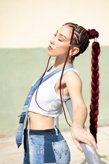 Young woman's confident pose in unique denim