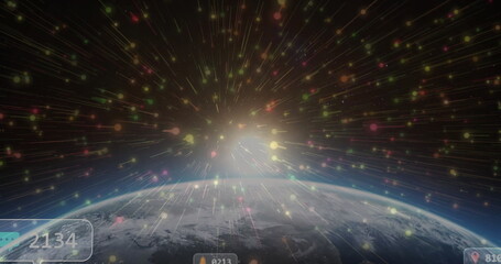 Showing curved Earth surface emerging in space, with radiant light rays and multicolored particles