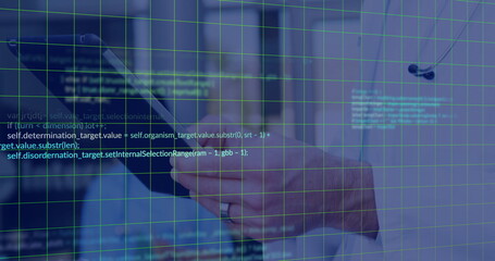 Hands holding black tablet computer in modern office lab, with grid code overlay, floating earbud