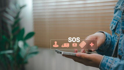 Hand holding smartphone with virtual SOS emergency medical icons, concept of digital healthcare, emergency call, health support technology, and telemedicine app.