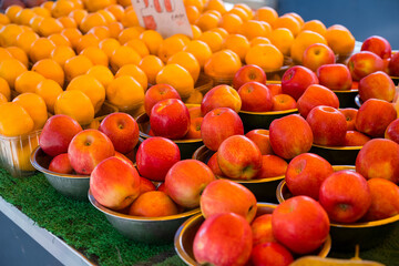 Fresh red and yellow apples, outdoor fruit farm market