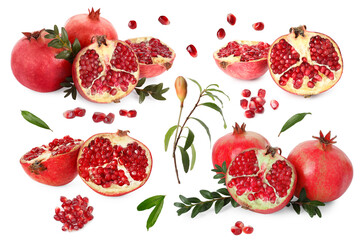 Pomegranate fruits and green leaves isolated on white, set