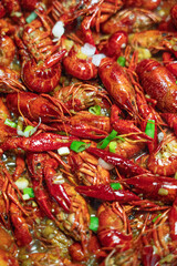boiled Asian Food Spicy crawfish or crayfish .