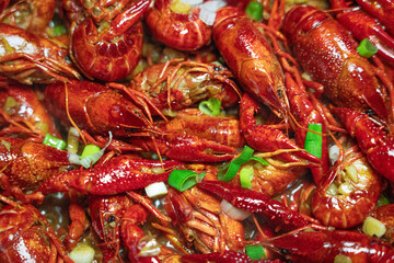 boiled Asian Food Spicy crawfish or crayfish .
