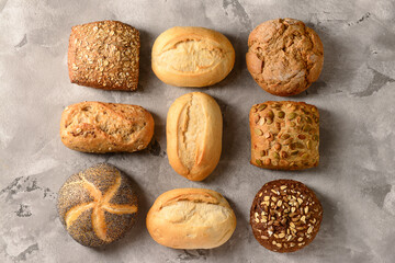 Many different buns on grey grunge background