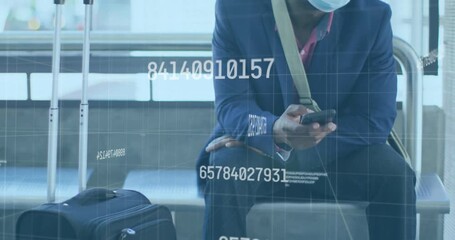 Business traveler swiping smartphone at airport initiating overlays and gazing at gate announcement - Powered by Adobe