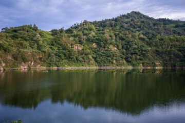 mountain lake quarry lake idyll with water reflections