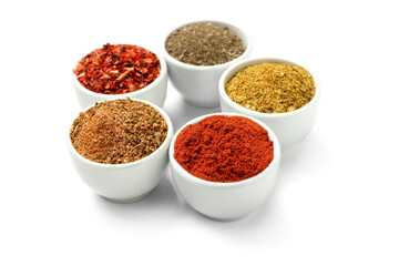 Composition with bowls of different aromatic spices on white background