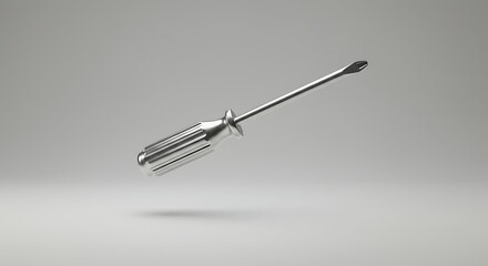 Metal Screwdriver with Sleek Handle Floating Against Minimalist Background