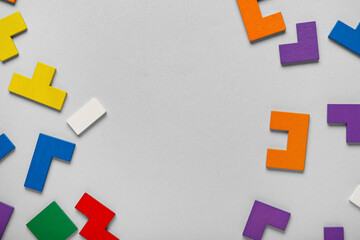 Frame made of colorful blocks on grey background. Logic concept