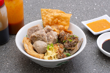 Bakso popular Indonesian foods, Beef Meatballs with noodles, dumpling and fried tofu